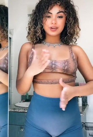 Sweet Devenity Perkins Shows Cleavage in Cute Snake Print Crop Top (Underboob)