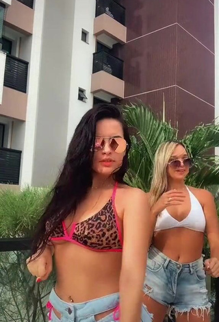 Hot Dine Azevedo Shows Cleavage in Bikini Top