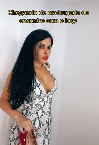 1. Sweetie Dine Azevedo Shows Cleavage in Snake Print Dress