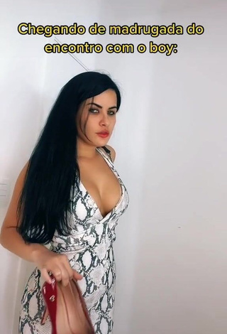 Sweetie Dine Azevedo Shows Cleavage in Snake Print Dress