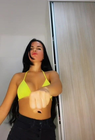 4. Alluring Dine Azevedo in Erotic Yellow Bikini Top