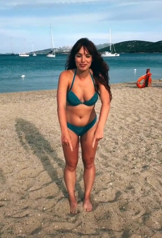 1. Sexy Eleonora Olivieri Shows Cleavage in Turquoise Bikini at the Beach and Bouncing Boobs