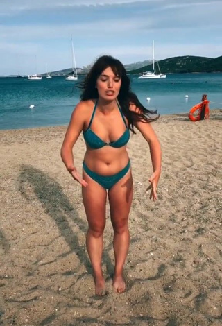 Sexy Eleonora Olivieri Shows Cleavage in Turquoise Bikini at the Beach and Bouncing Boobs