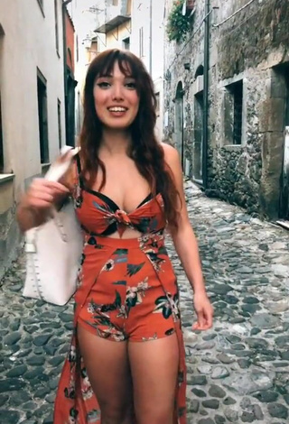 1. Hot Eleonora Olivieri in Floral Overall in a Street