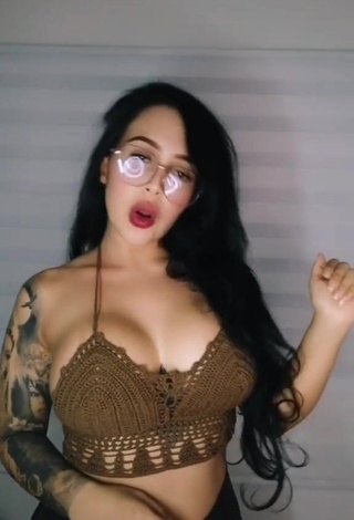 1. Eve Herrera Shows Cleavage in Hot Brown Crop Top