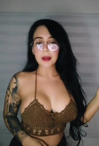 Eve Herrera Shows Cleavage in Hot Brown Crop Top