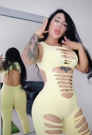 3. Beautiful Eve Herrera Shows Cleavage in Sexy Yellow Overall