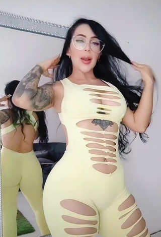 4. Beautiful Eve Herrera Shows Cleavage in Sexy Yellow Overall