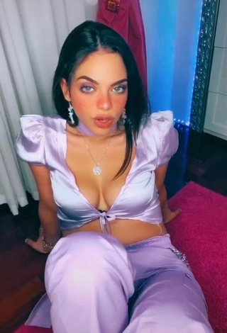 Beautiful Giulia Paglianiti Shows Cleavage in Sexy Purple Crop Top