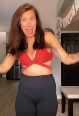 Hot Kat Stuckey Shows Cleavage in Red Bikini Top