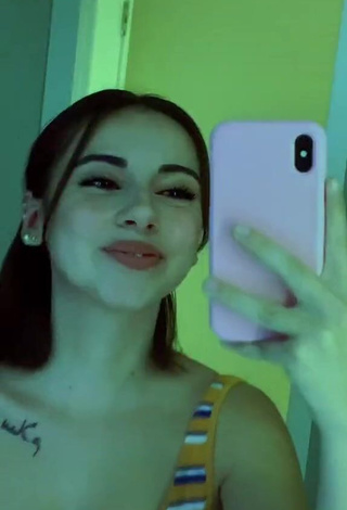 1. Sexy Ines.roml Shows Cleavage in Striped Dress