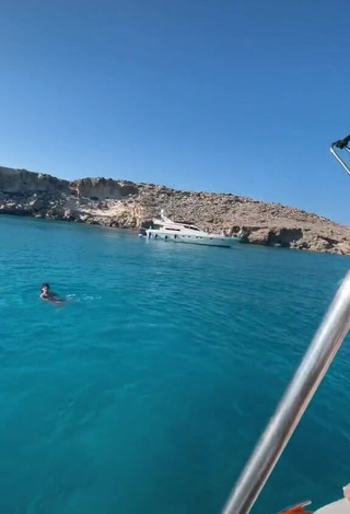 3. Hot Rina in Blue Bikini on a Boat