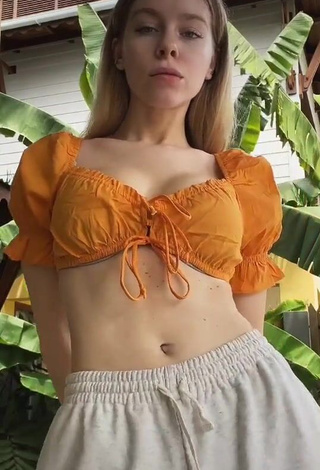 Desirable Ira Blanc in Orange Crop Top