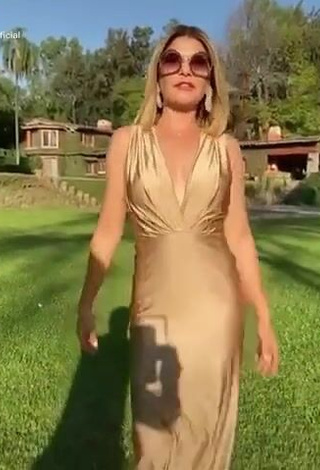 1. Hot Tati Cantoral in Golden Dress