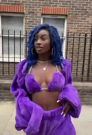 1. Hot Oluwanifewa Agunbiade Shows Cleavage in Violet Bikini Top in a Street