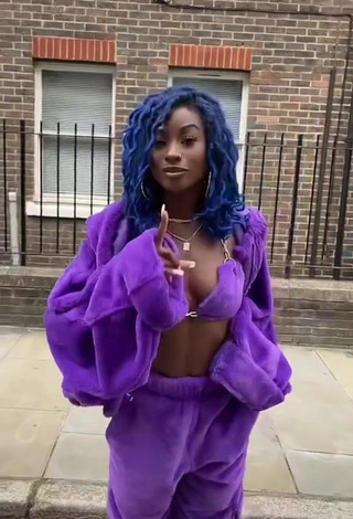 Hot Oluwanifewa Agunbiade Shows Cleavage in Violet Bikini Top in a Street