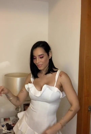 1. Seductive Jessi Pereira Shows Cleavage in White Dress