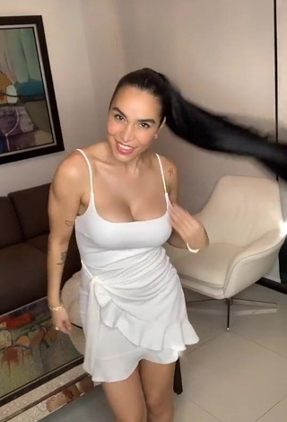 Gorgeous Jessi Pereira Shows Cleavage in Alluring White Dress