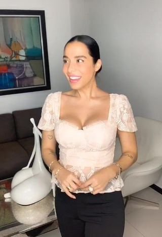 Beautiful Jessi Pereira Shows Cleavage in Sexy Beige Top