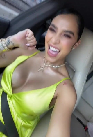 4. Breathtaking Jessi Pereira Shows Cleavage in Green Dress in a Car