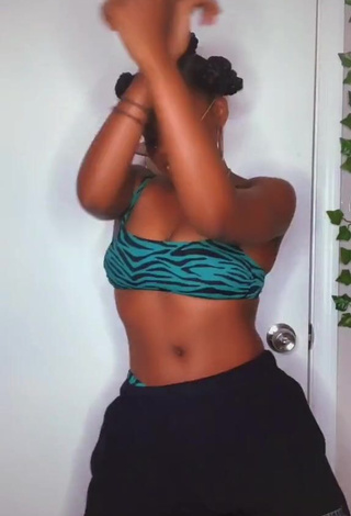 4. Hot Jordan Nata'e Shows Cleavage in Zebra Bikini Top