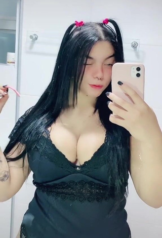 Hot Karniello Shows Cleavage in Black Bodysuit and Bouncing Big Breasts