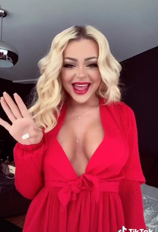 4. Desirable Katja Krasavice Shows Cleavage in Red Dress