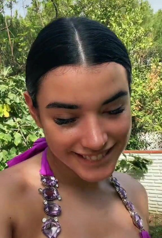 Hot Kiara Brunett Shows Cleavage in Violet Bikini