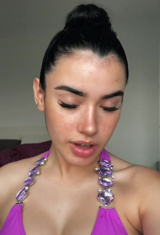 1. Sexy Kiara Brunett in Violet Bikini Top