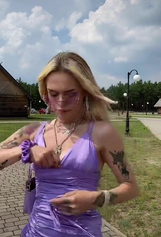 Hot Klaudia Bieszcz Shows Cleavage in Violet Dress