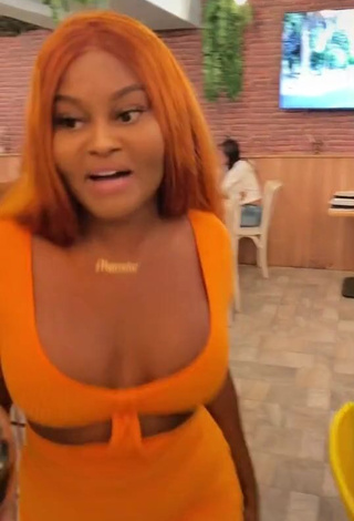 1. Hot Lajesuu Shows Cleavage in Orange Dress