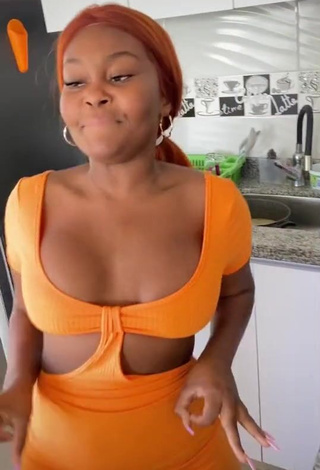 Hot Lajesuu Shows Cleavage in Orange Dress