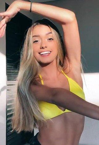 3. Luane Guiné Looks Seductive in Yellow Bikini Top