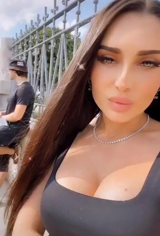 4. Hot Lusik Karapetyan Shows Cleavage in Black Top