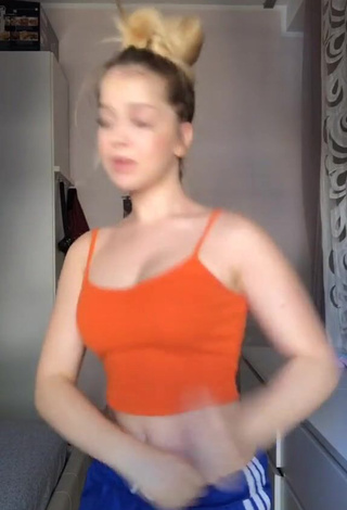 Sexy Marta D'Addato in Orange Crop Top and Bouncing Boobs