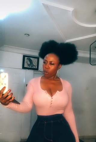 1. Sexy Lilly Chioma Shows Cleavage in Pink Top