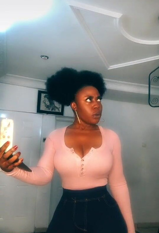 4. Sexy Lilly Chioma Shows Cleavage in Pink Top