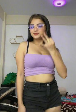 Hot Marylaine Amahit Shows Cleavage in Purple Crop Top