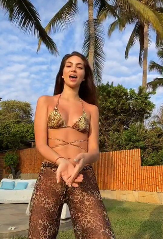 Hot Natalie Vértiz Shows Cleavage in Leopard Bikini Top