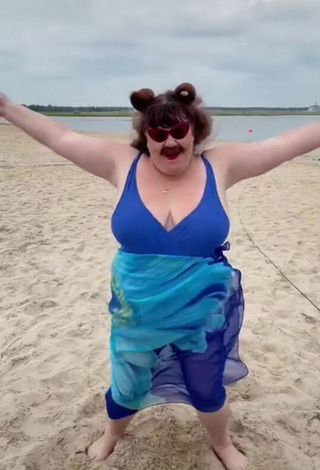 Hot Netta Barzilai Shows Cleavage at the Beach and Bouncing Big Breasts