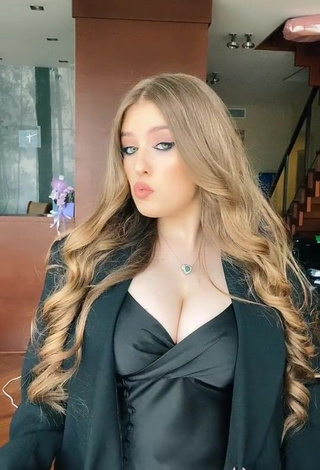 Hot Viktoria Nikulina Shows Cleavage in Black Dress