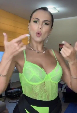 4. Hot Nastia Kamenskykh Shows Cleavage in Lime Green Bodysuit