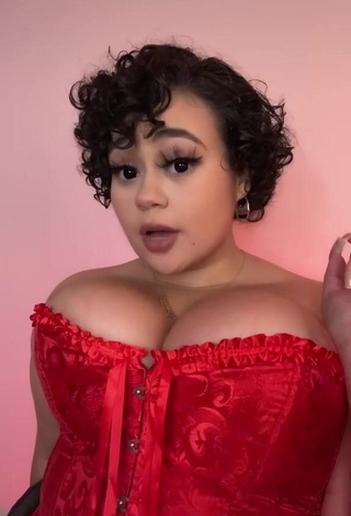 Desirable Phaith Montoya Shows Cleavage in Red Corset