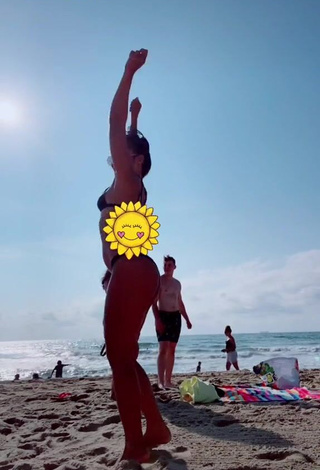 Erotic Virgie Ann Casteel in Black Bikini at the Beach