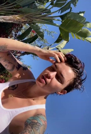 3. Hot Ruby Rose in White Top