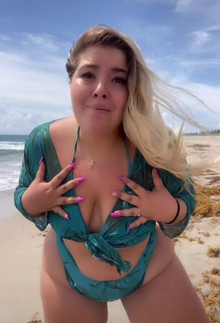 Hot Sam Paige Shows Cleavage in Green Bikini at the Beach