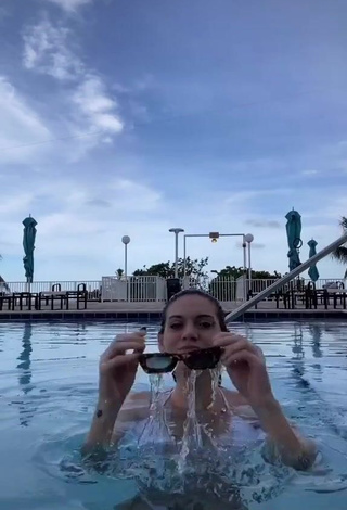 4. Fine Sasha Ferro Shows Cleavage in Sweet White Bikini at the Pool