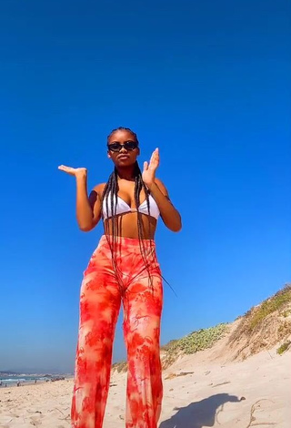 1. Hot Sphokuhle.n Shows Cleavage in White Bikini Top at the Beach