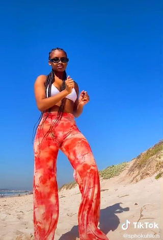 Hot Sphokuhle.n Shows Cleavage in White Bikini Top at the Beach