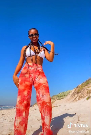 4. Hot Sphokuhle.n Shows Cleavage in White Bikini Top at the Beach